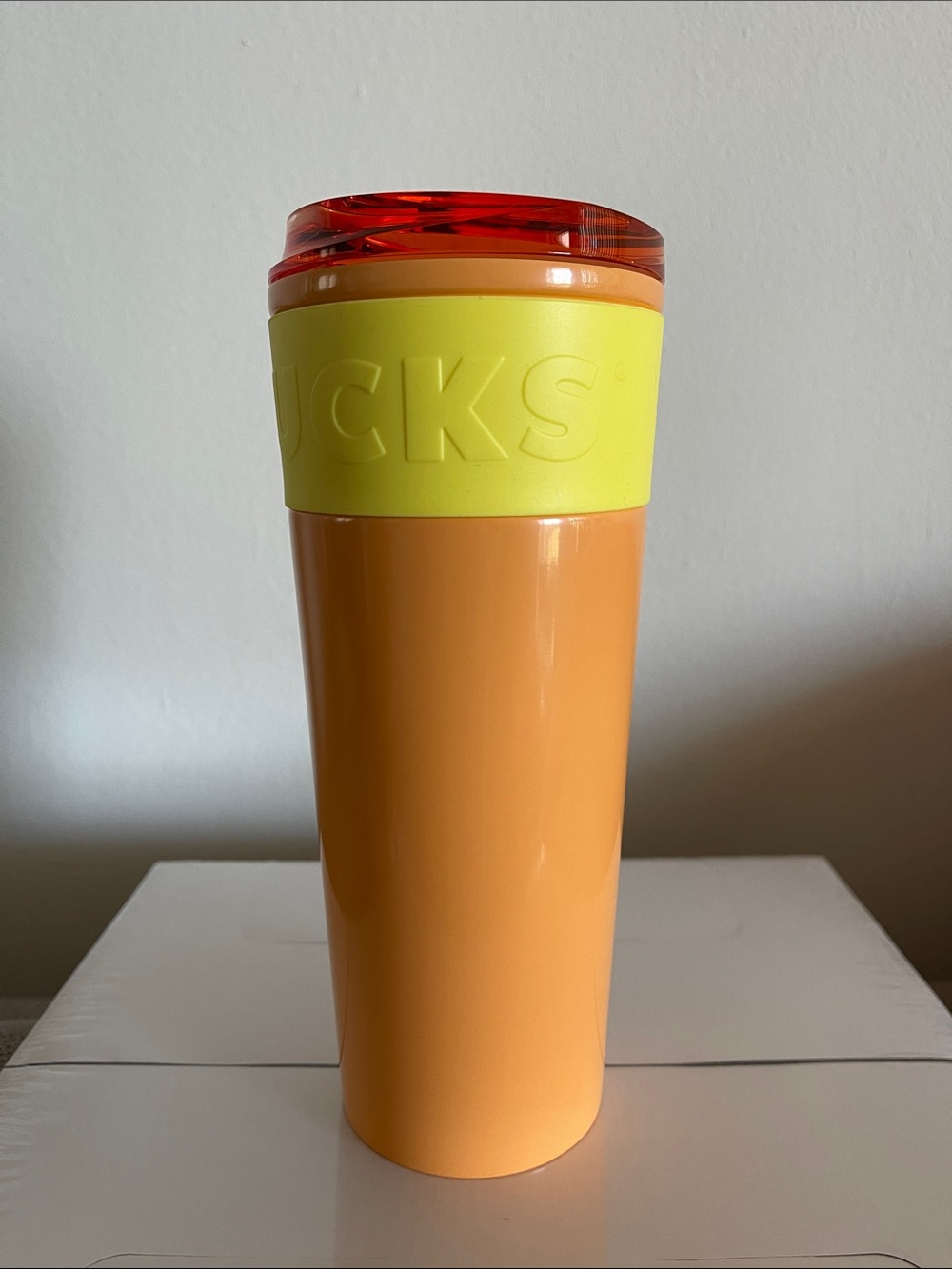 Starbucks Orange Tumbler with Yellow Grip Lid